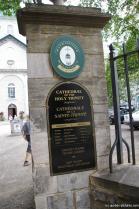 Cathedral of the Holy Trinity hours and guide tours sign in Quebec City.jpg