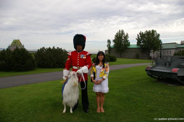 Joann with Officer and Goat at La Citadel in Quebec.jpg
