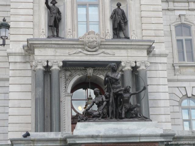 Native American statues at the Quebec Parliament Building.jpg
