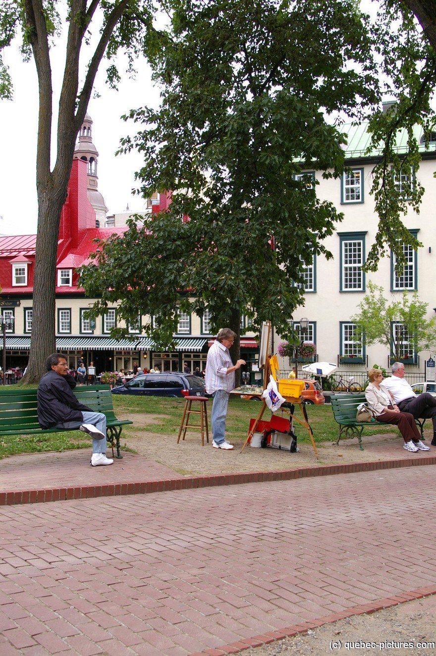 Artist painting at a square in Old Quebec City.jpg
